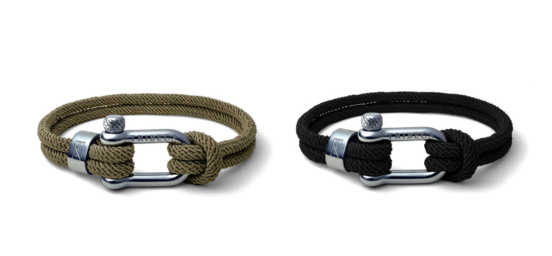 Two bracelets with metal clasps and rope design on a white background