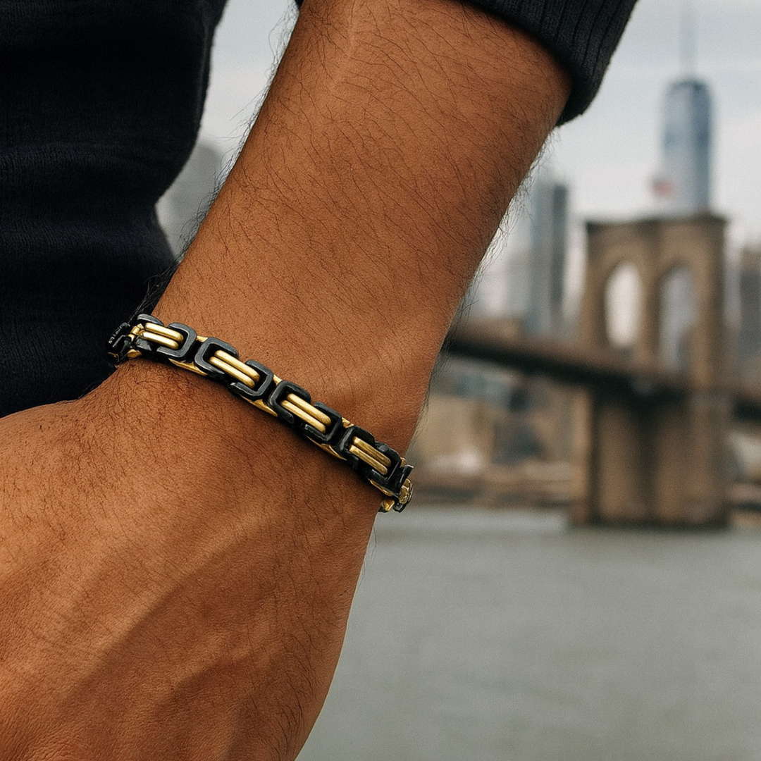 Bracelet on a wrist with a blurred cityscape background