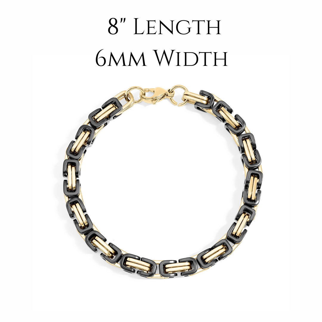 Bracelet with gold and black links on a white background. 8" length, 6mm width