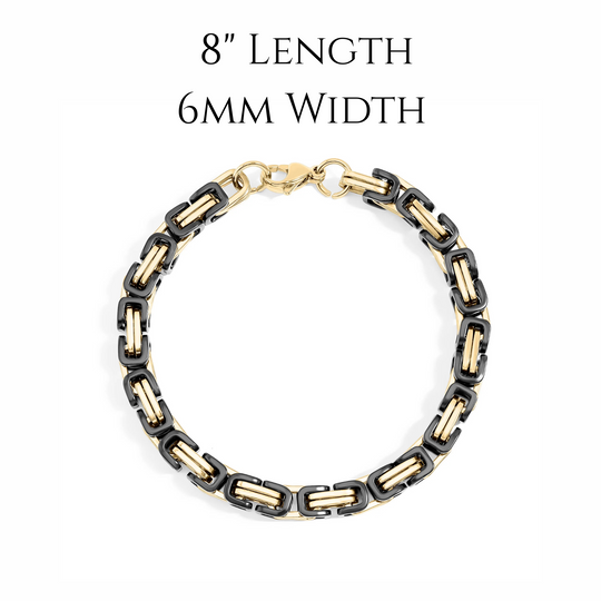 Bracelet with gold and black links on a white background. 8" length, 6mm width