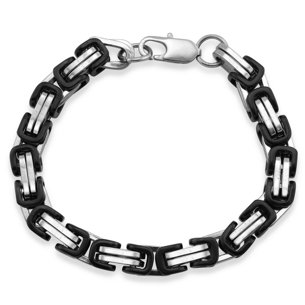 Black and silver chain bracelet on a white background