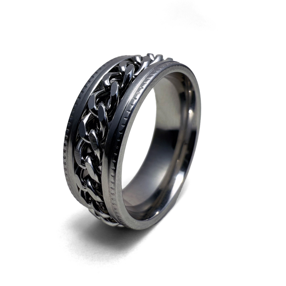 A stainless steel bracelet with a chain link design around the perimeter 