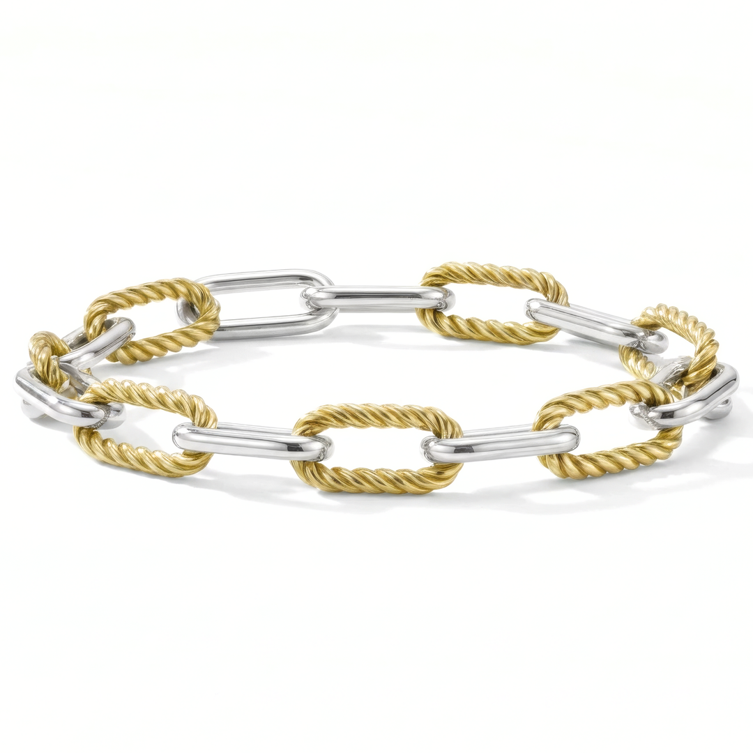 Two-layered bracelet with gold and silver links on a white background