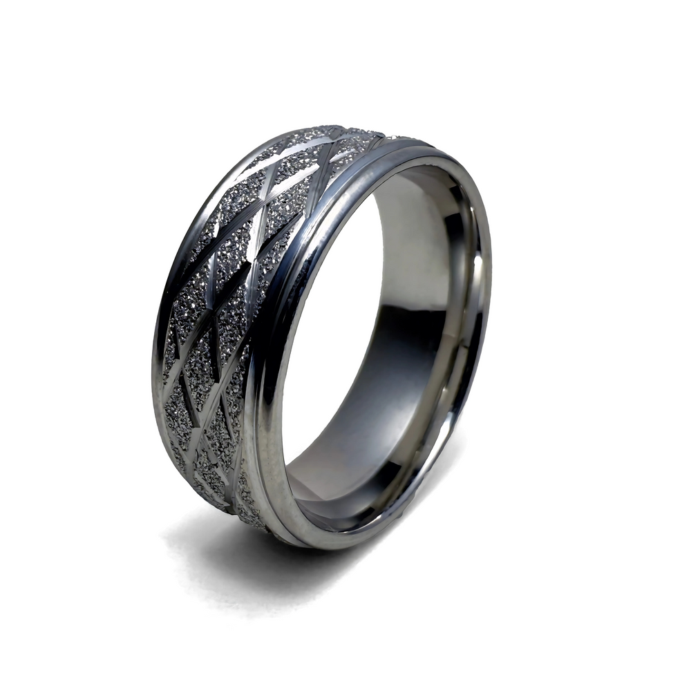 A stainless steel ring with a diamond, textured pattern along the perimeter 