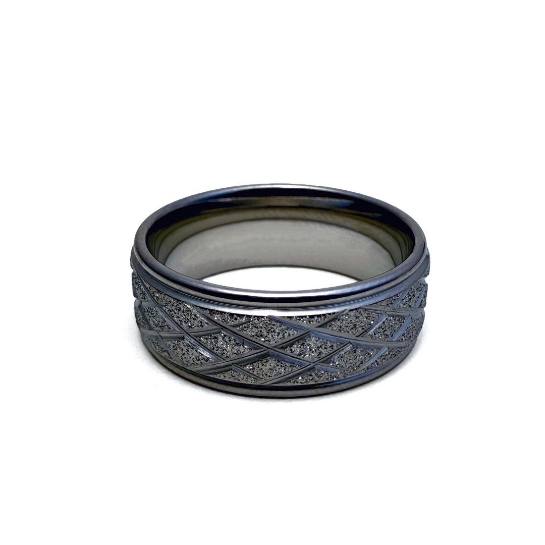 This image features the "Chrysler Ring," showcasing its robust and stylish design. The ring features a textured diamond design along the outside 