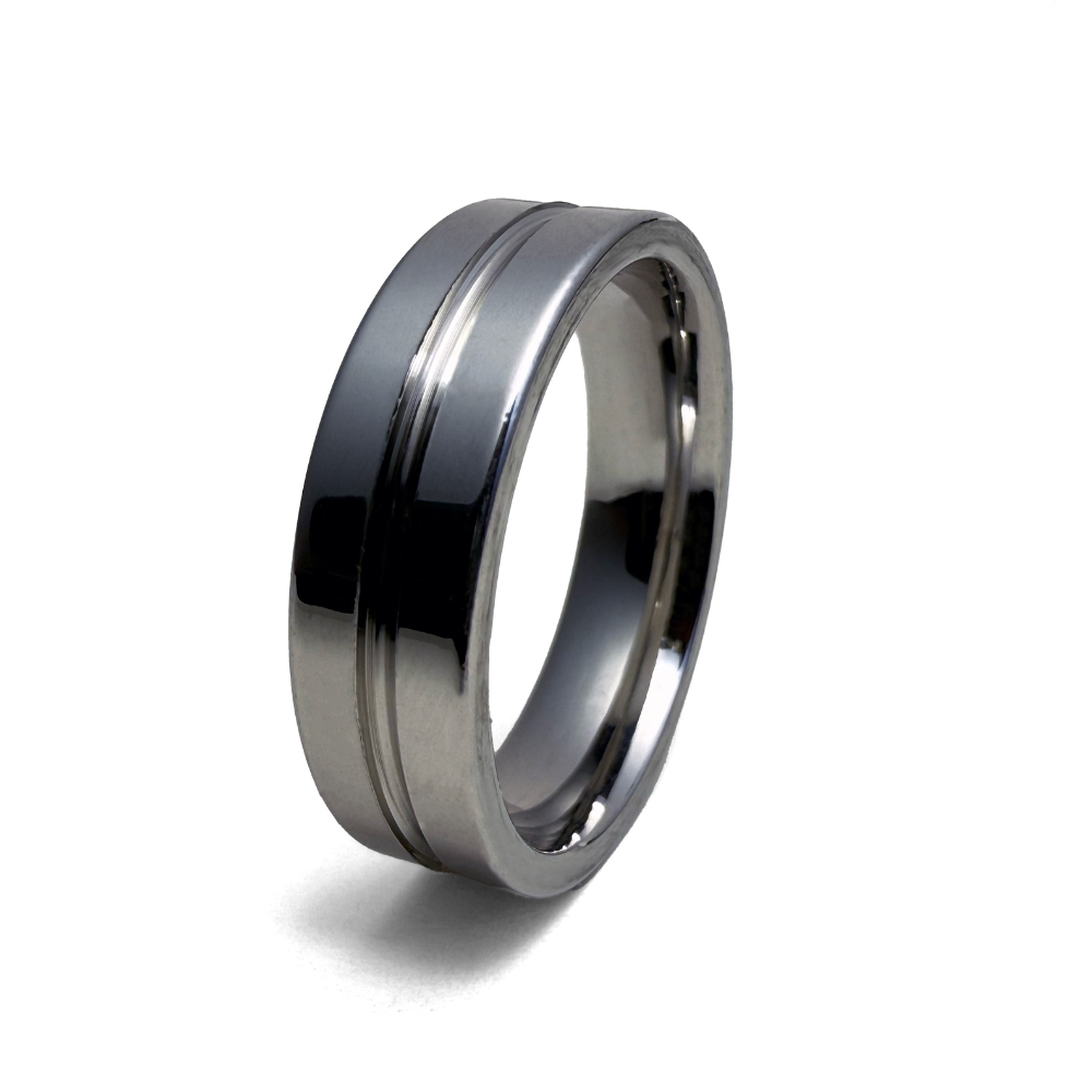 This image displays the Empire Ring, highlighting its sleek and polished design. The ring features a dual-tone color scheme, with a primary silver hue complemented by a darker stripe running along its length.