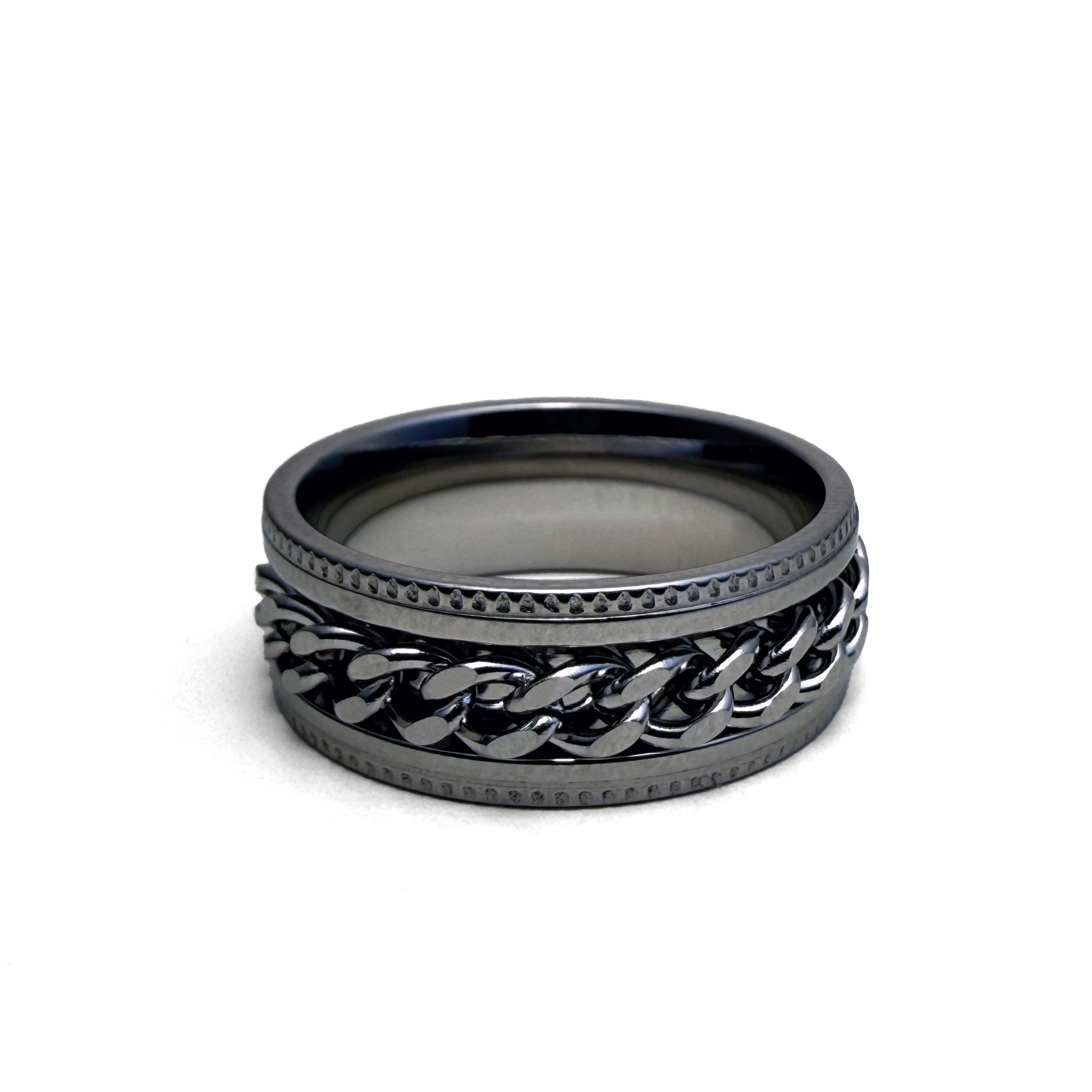 This image features the "Empire Ring," a stylish accessory with a sophisticated design. The ring displays a dual-tone color scheme with a primary dark metallic finish complemented by a contrasting lighter chain-link pattern.