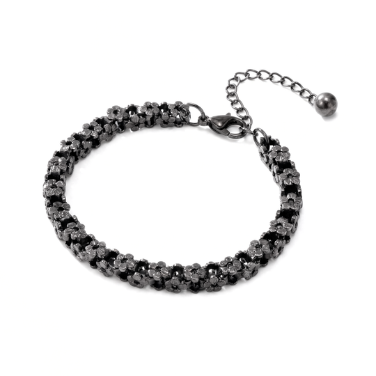 Black metal floral bracelet on a white background