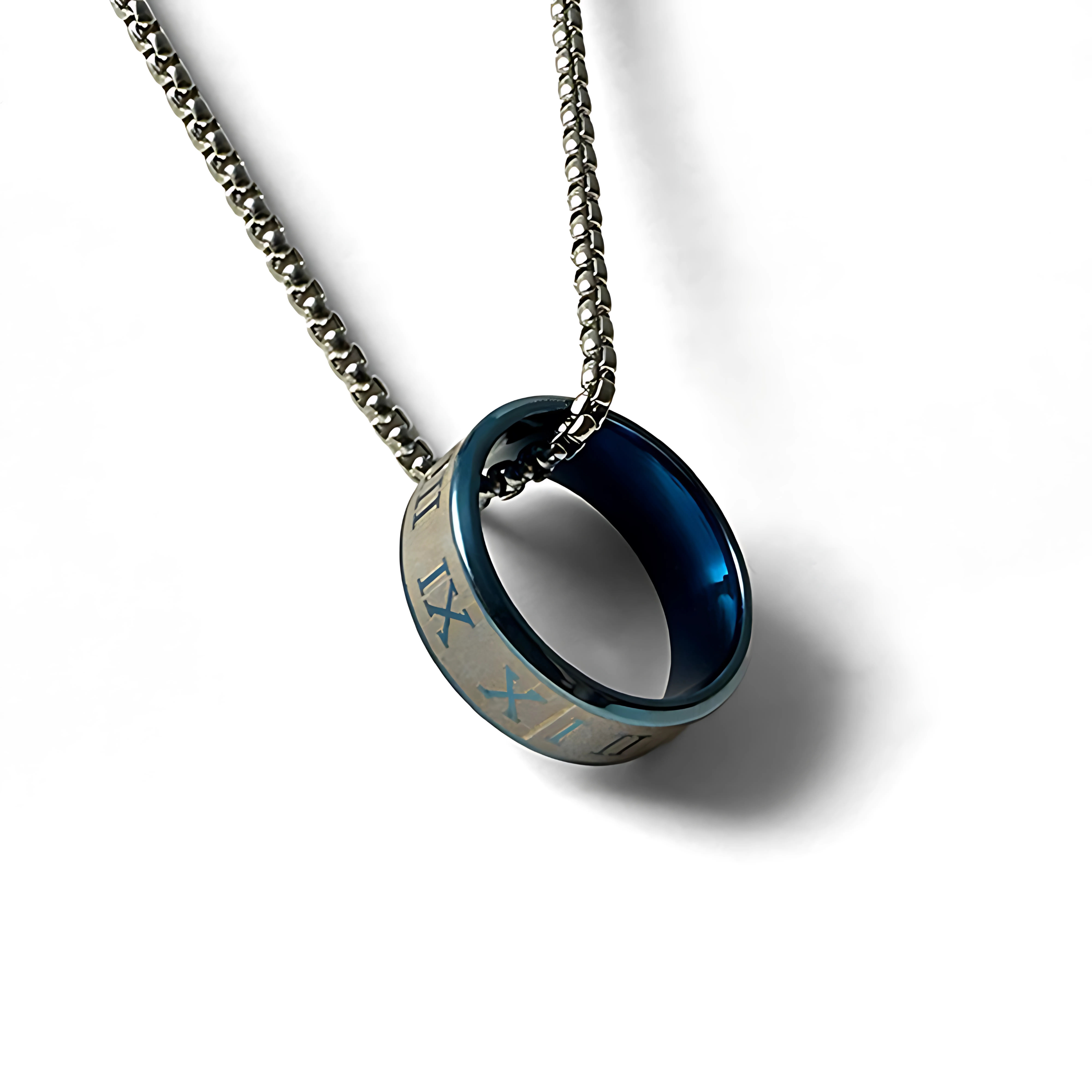 This image features a stylish necklace titled "Ring Necklace Midnight". The necklace presents a unique design with a circular pendant that resembles a ring, accentuated by a striking blue interior and intricate engravings along its exterior.