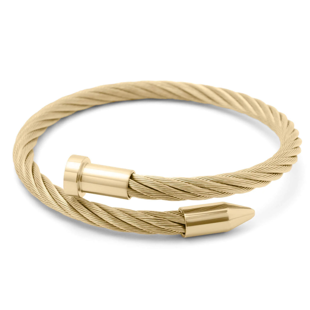 Gold cable bracelet with cylindrical clasp on a white background
