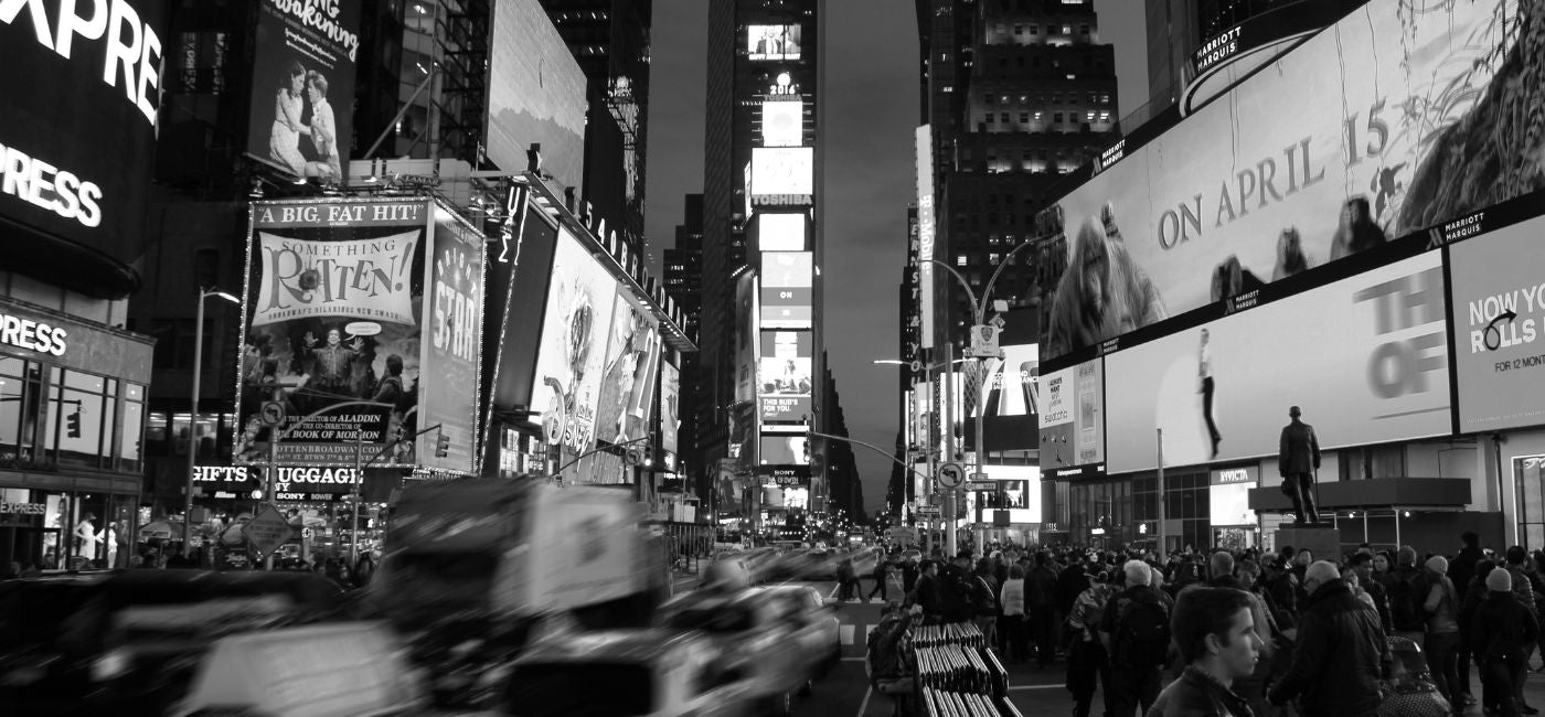 A black and white image of Time Square in New York City 