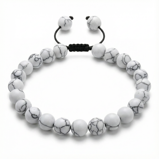 White marbled beaded bracelet with black cord on a white background
