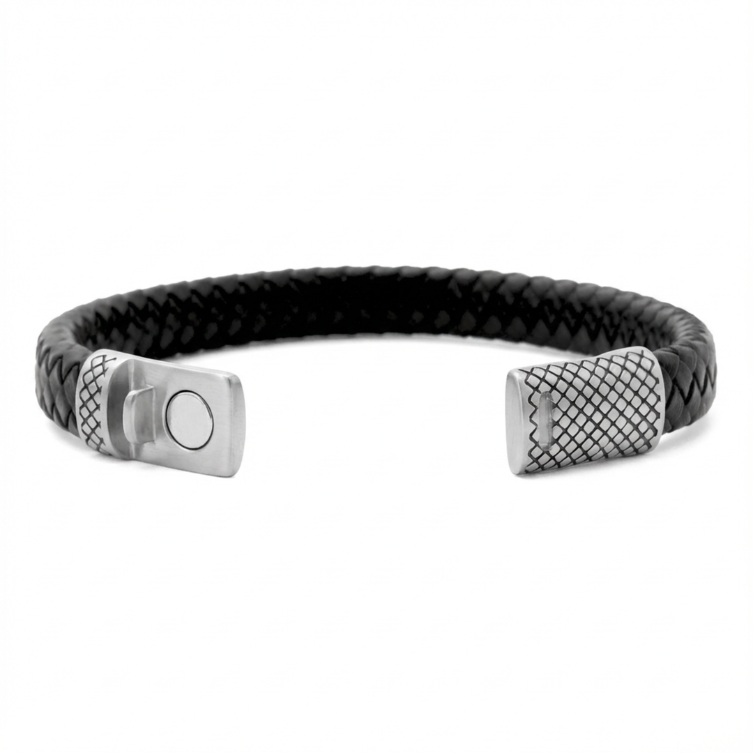 Black braided bracelet with silver metal clasp on a white background